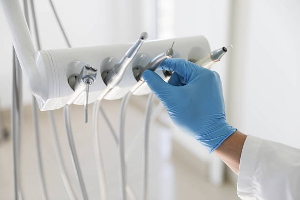 Professional Teeth Whitening technician working in Fairview, NY